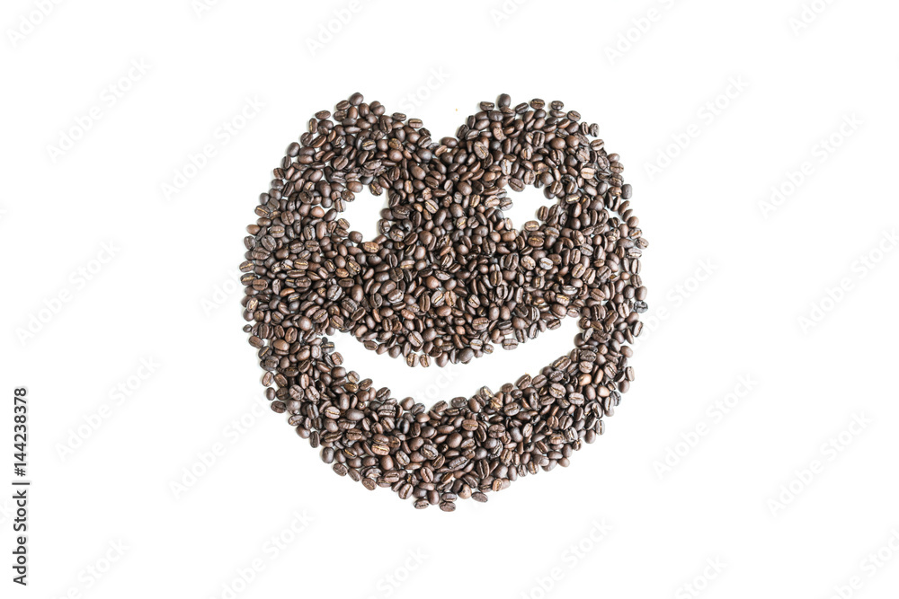 Coffee beans are arranged in a smiley image. Coffee beans are arranged in a smiley image.