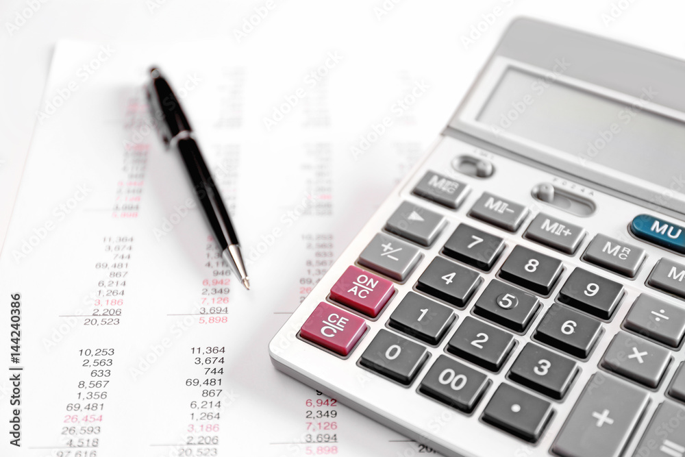 Health planning concept. Calculator and pen on bill background Health planning concept. Calculator and pen on bill background