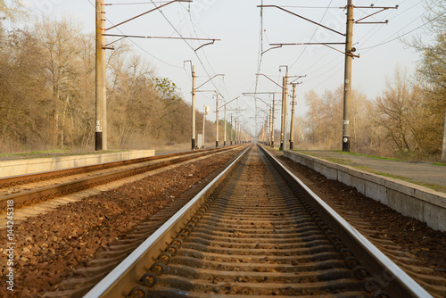 The railway track, going off into the distance, on the side-platform for landing