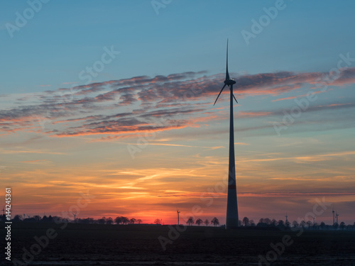 great wind turbine at sundown