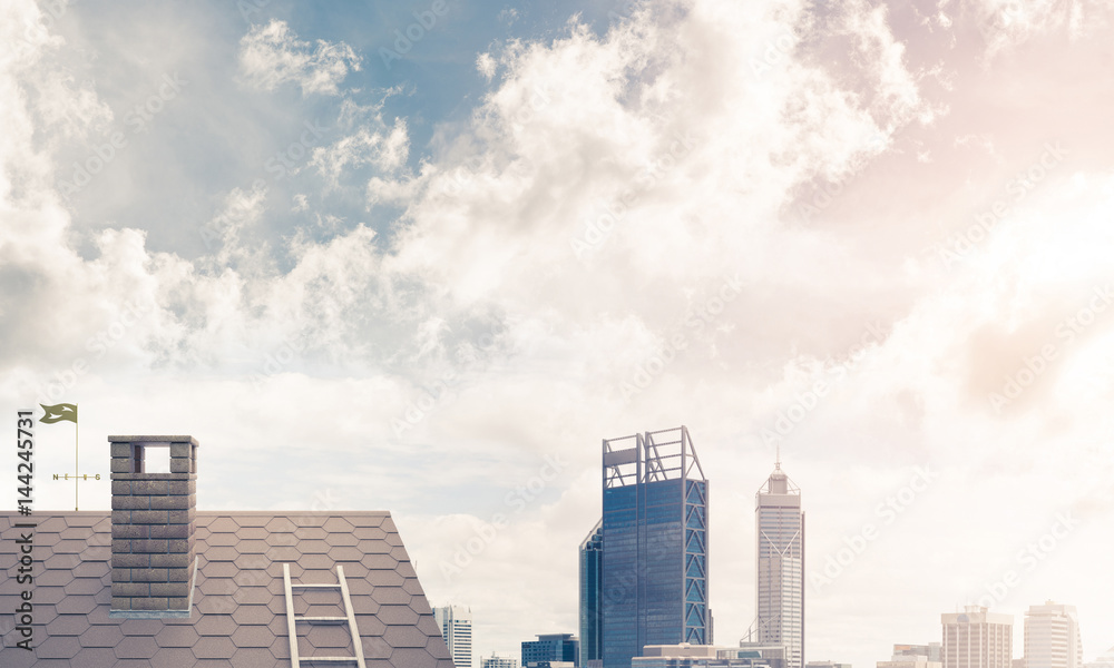 Obraz premium Brick house roof and modern cityscape at background