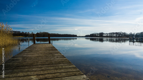Fototapeta Naklejka Na Ścianę i Meble -  calm lake with landing stage landscape