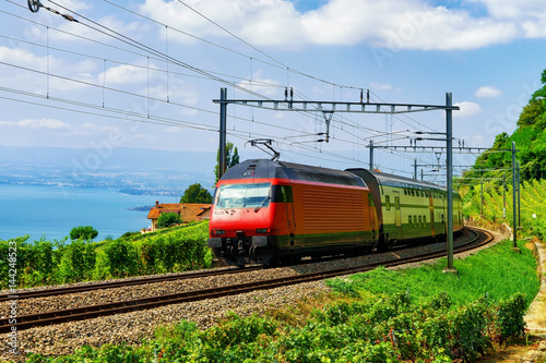 Train and railroad in Lavaux Vineyard Terraces Lake Geneva Alps
