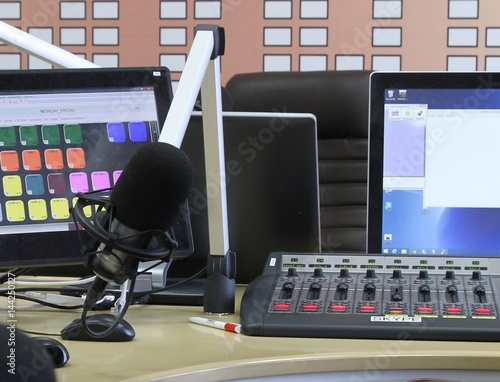 Radio station. Microphone in a recording studio photo