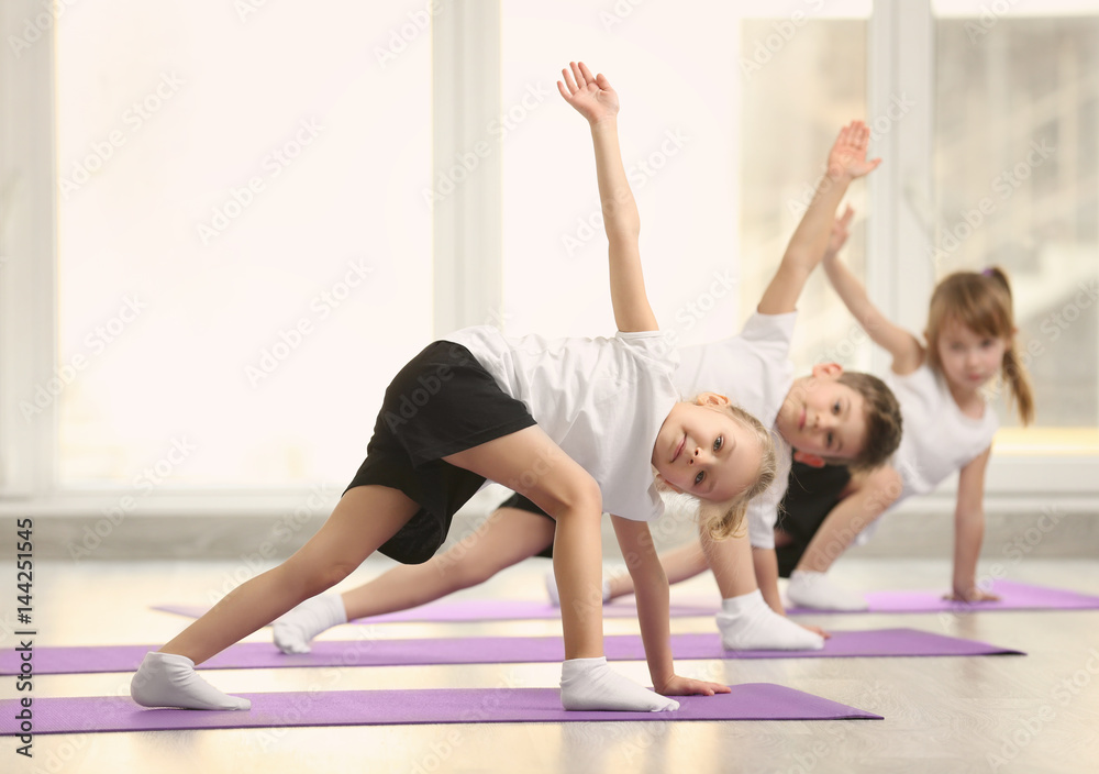 Group of children doing gymnastic exercises