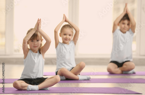 Group of children doing gymnastic exercises