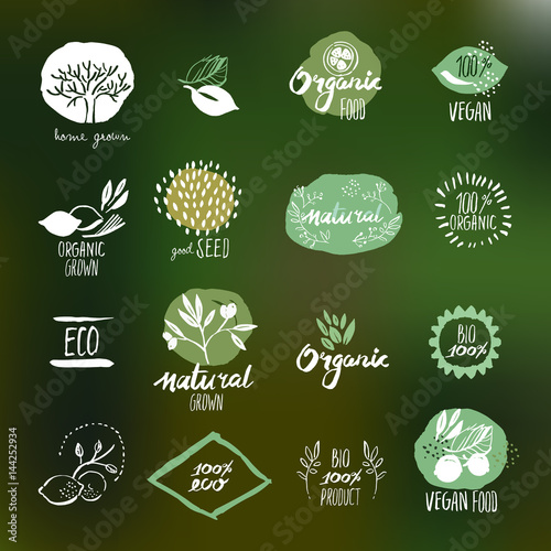 Set of hand drawn style stickers and badges for organic food and drink, natural products, restaurant, healthy food market and production, on the nature background. Vector illustrations.