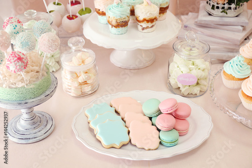 Candy bar. Table with different sweets for party