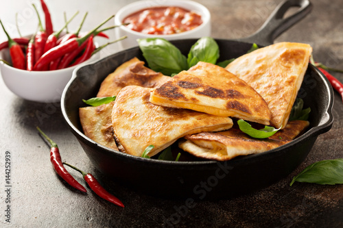 Cheese quesadillas in a cast iron pan