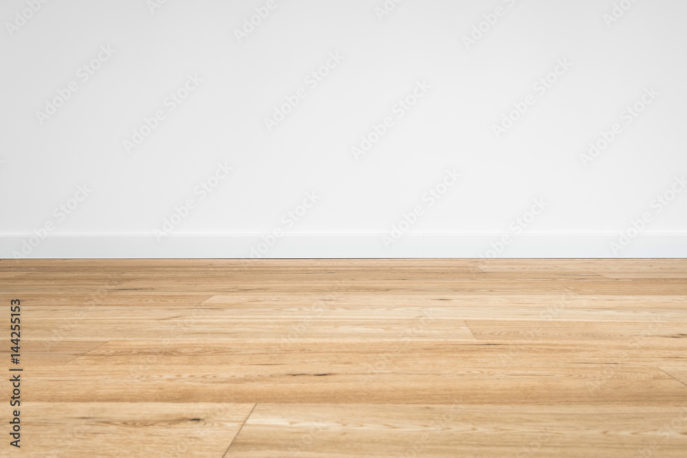 new wooden floor  - parquet floor and white wall background  - obrazy, fototapety, plakaty 