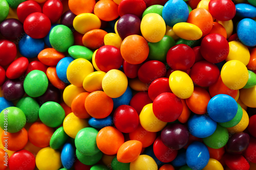 Delicious colorful candies as background Delicious colorful candies as background