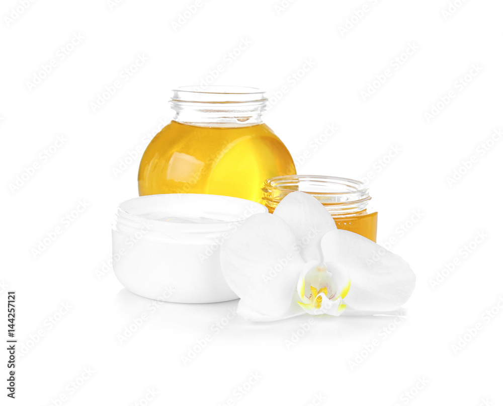 Nutrient cosmetic and delicious honey for spa on white background Nutrient cosmetic and delicious honey for spa on white background