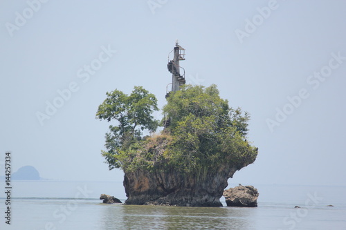 Lianga Bay lighthouse The lighthouse sits atop one of the many islets in the Lianga Bay in Surigao del Sur, southern Philippines. photo