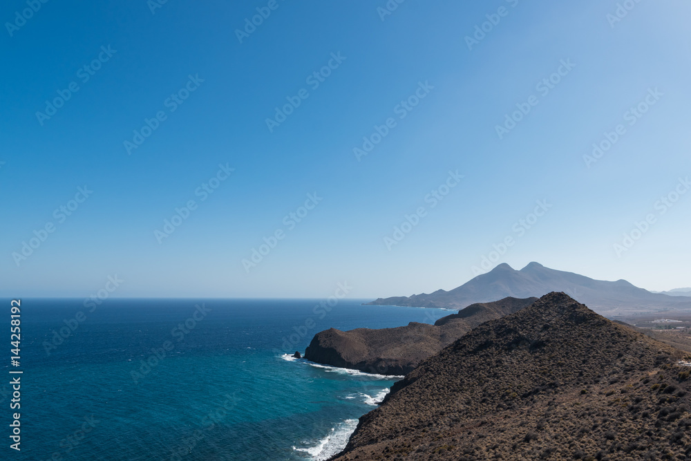 Fototapeta premium mountains by the sea coastline