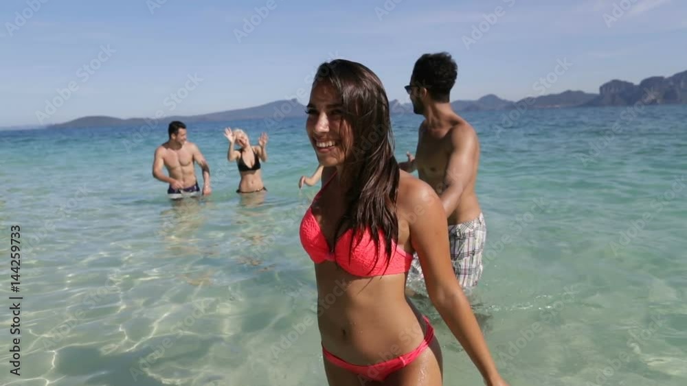 Happy Smiling Woman Holding Man Hand Lead, People Coming From Water On Beach, Tourists Group On Sea Vacation Slow Motion 120 Happy Smiling Woman Holding Man Hand Lead, People Coming From Water On Beach, Tourists Group On Sea Vacation Slow Motion 120