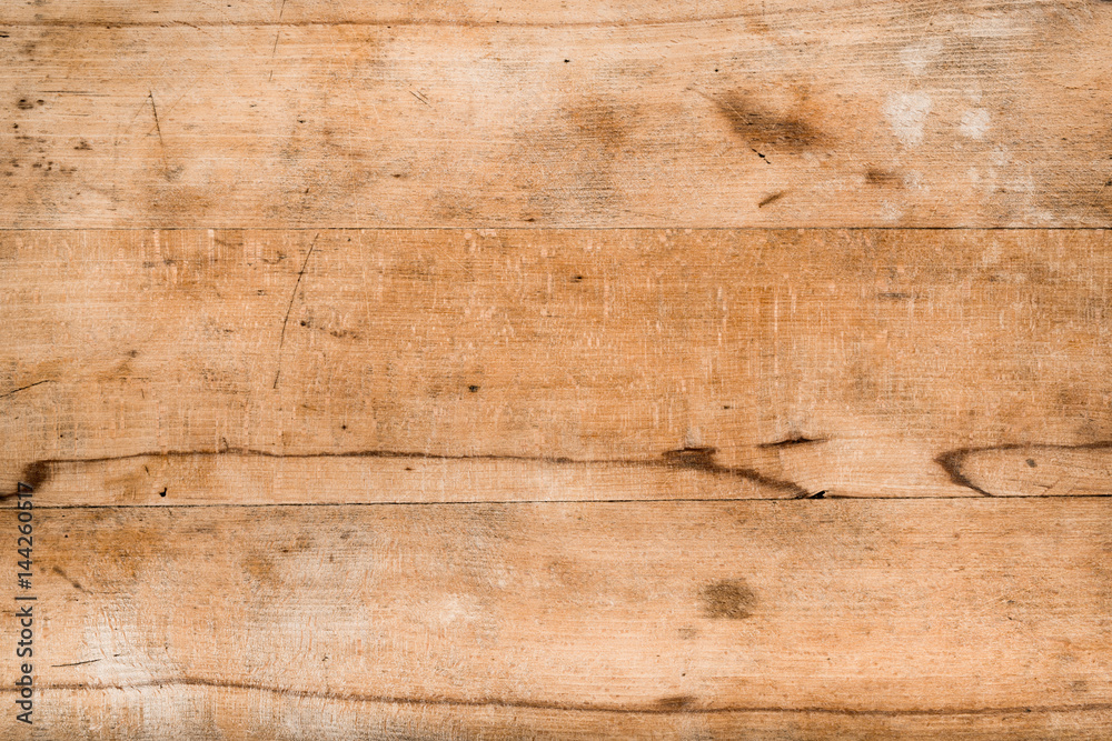 Obraz premium Stary, porysowany drewniany panel jako tło, drewniana tekstura