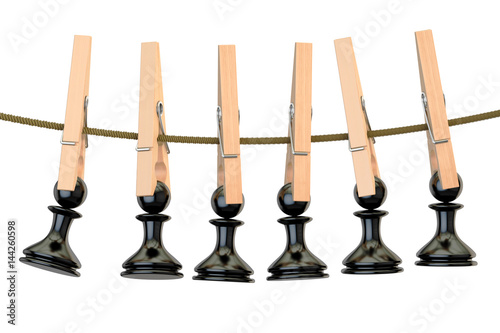 Black chess pawns on rope with clothespin, 3D rendering