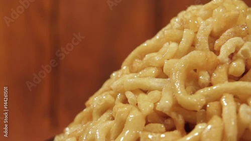 Traditional home oriental sweetness from flour with honey closeup.