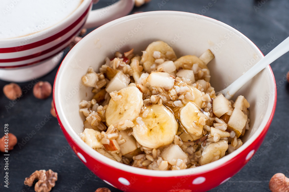 Healthy breakfast, oatmeal, banana, pear, honey, flax seeds, chia seeds Healthy breakfast, oatmeal, banana, pear, honey, flax seeds, chia seeds