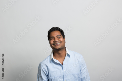 Studio portrait of an excited professional man © FotoSushi