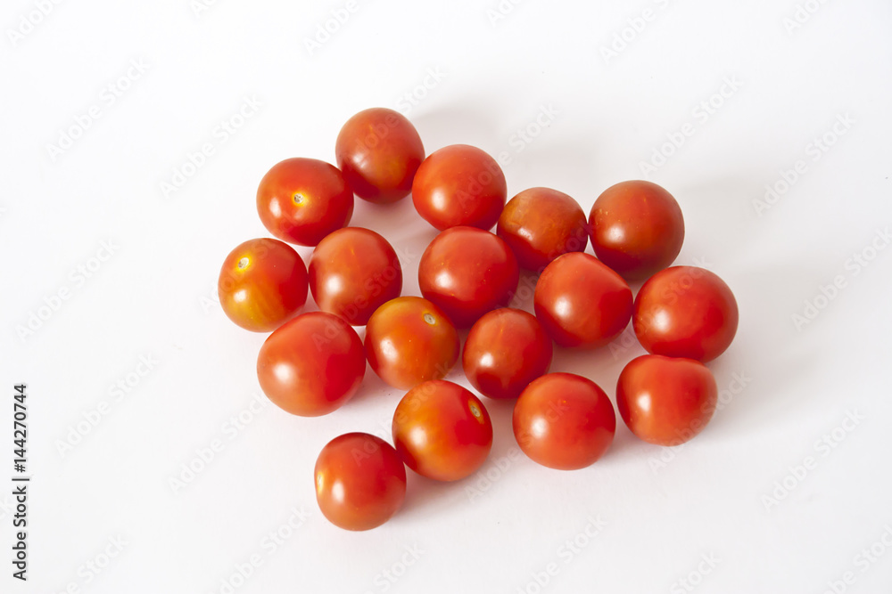 Cherry tomatoes on a white background, fresh tomatoes Cherry tomatoes on a white background, fresh tomatoes
