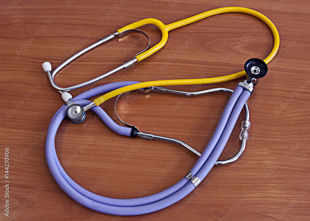 Phonendoscopes on the doctor's desk, medical instruments Phonendoscopes on the doctor's desk, medical instruments