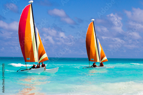 Leinwand Poster Catamarans on the ocean