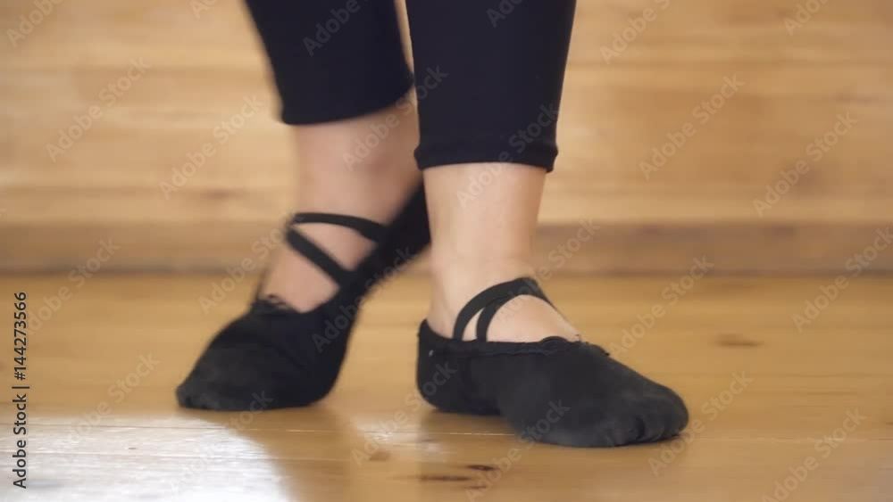 Closeup of girl standing on the toes Closeup of girl standing on the toes