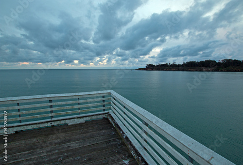San Simeon Public Pier under sunset clouds on the Central Coast of California USA © htrnr