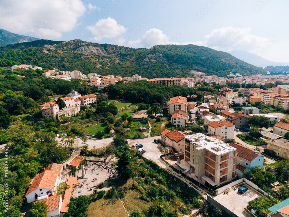 Construction of a multistory building in Budva, Podmayne district, near the monastery, Montenegro. aerial survey