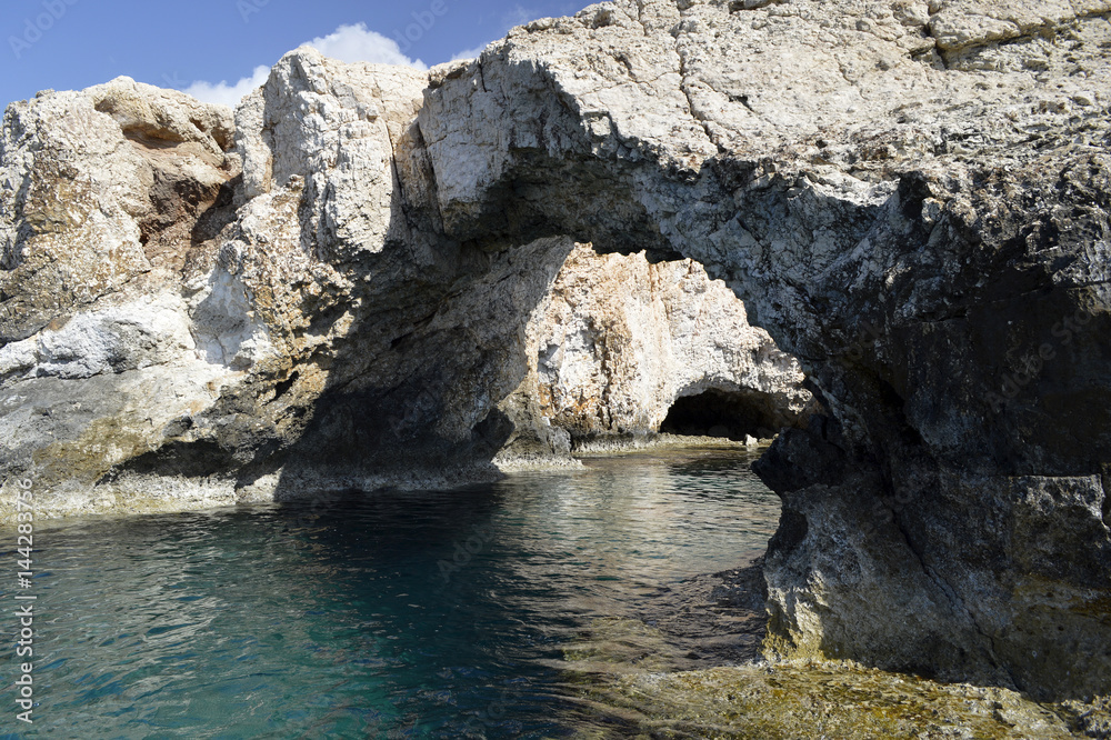 Natural stone bridge on the Mediterranean Sea.