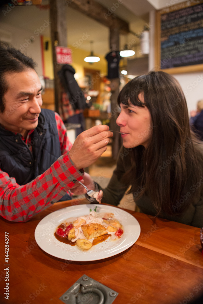 Mixed race couple dining at a restaurant Mixed race couple dining at a restaurant