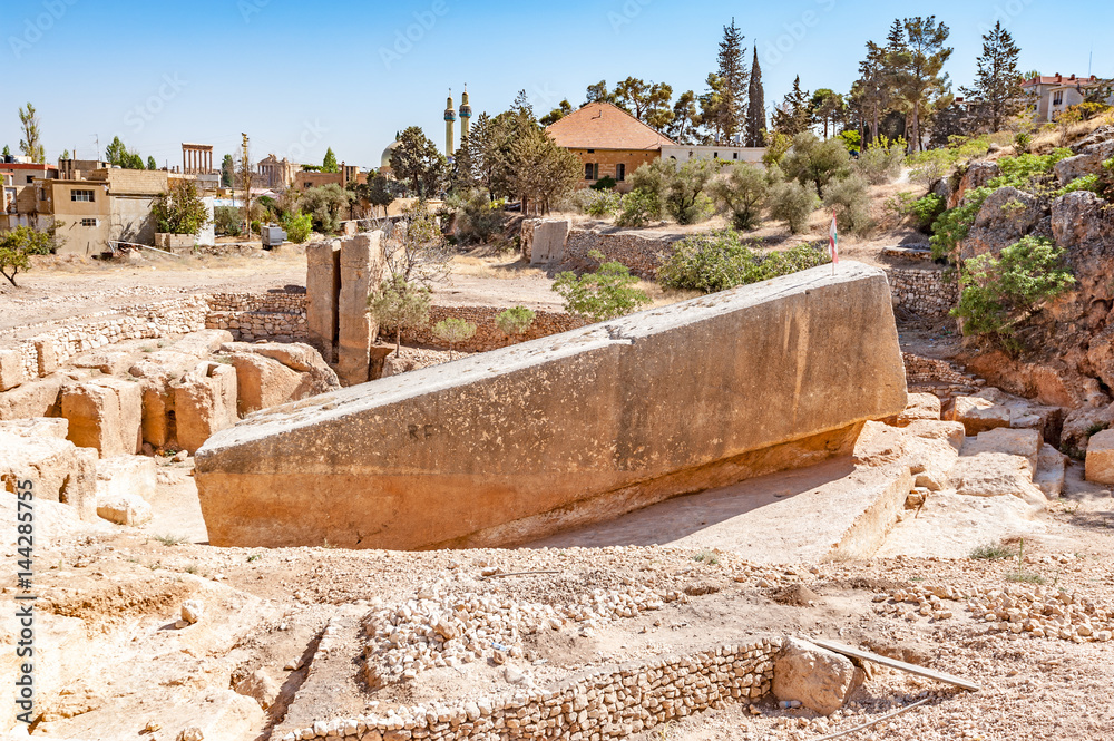Hajar al Hibla of Baalbek in Lebanon. It is located about 85 km northeast of Beirut and about 75 km north of Damascus and is known as Stone of the Pregnant Woman. 