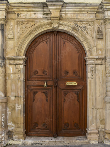 Old wooden brown door in Rethymnon. Greece