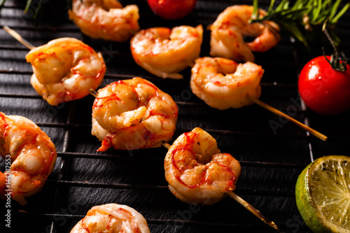 Grilled shrimp skewers. photo