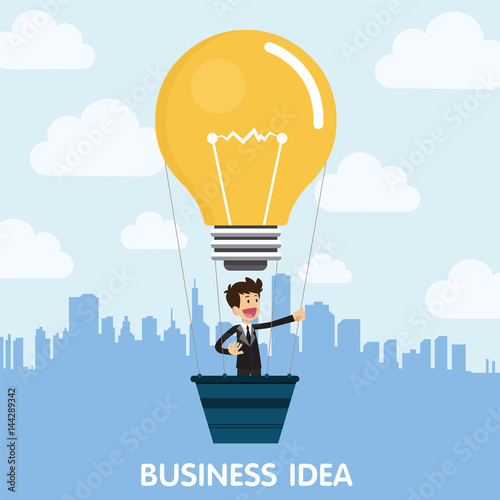 Businessman flying in a balloon