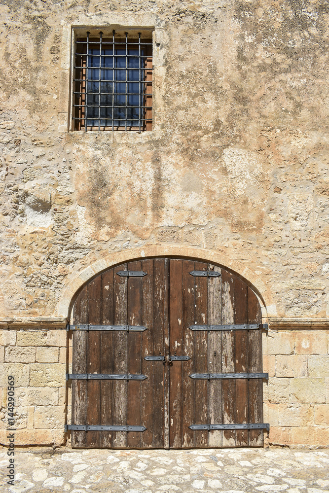 Old wooden gates and window  in Rethymnon. Greece