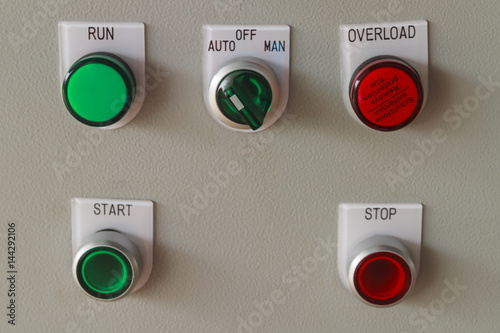 Obraz na płótnie Start and stop buttons on control panel of machine.
