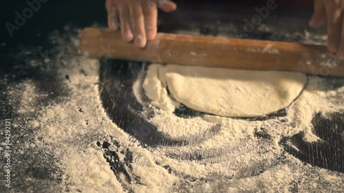 Chef preparing pizza dough. Slow Motion