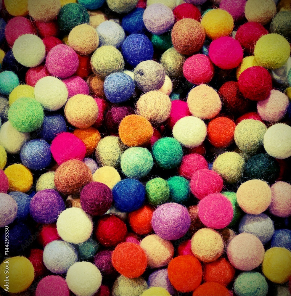 background of multicolored felt small balls background of multicolored felt small balls