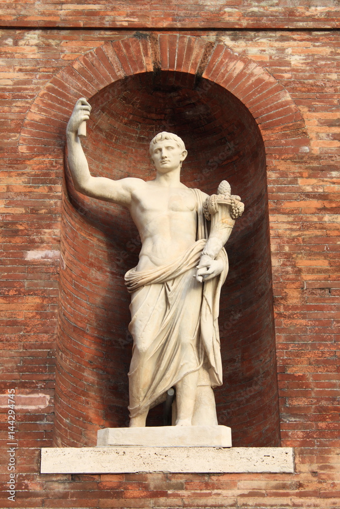 Ancient roman statue with cornucopia in Rome, Italy Ancient roman statue with cornucopia in Rome, Italy