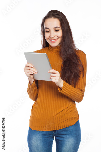 Smiling brunette and digital tablet