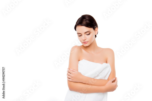 Young pretty cute girl standing in towel