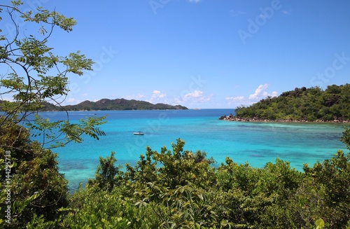 View to Anse Petite Cour and Curieuse Island which are situated in the north of Praslin Island, Seychelles, Indian Ocean, Africa © sarlay