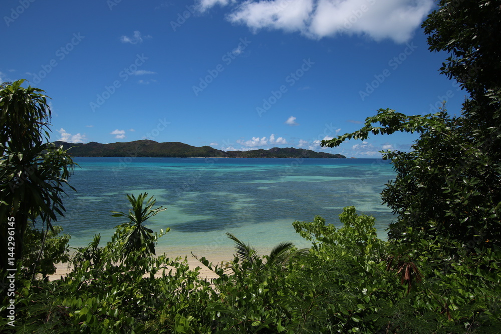 View to Anse Petite Cour and Curieuse Island which are situated in the north of Praslin Island, Seychelles, Indian Ocean, Africa