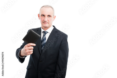 Portrait of senior showing his black leather wallet