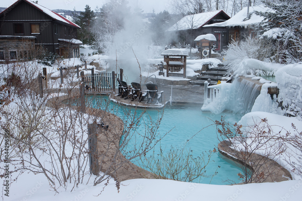 Outdoor spa covered in snow
