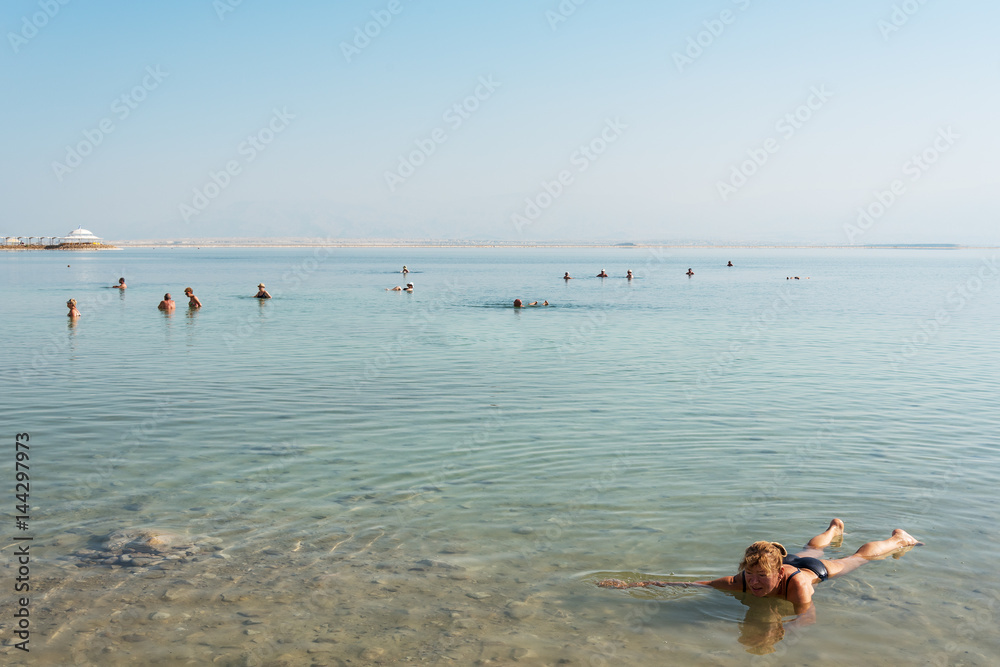 Swimmers in Dead sea, Ein Bokek, Israel. Swimmers in Dead sea, Ein Bokek, Israel.