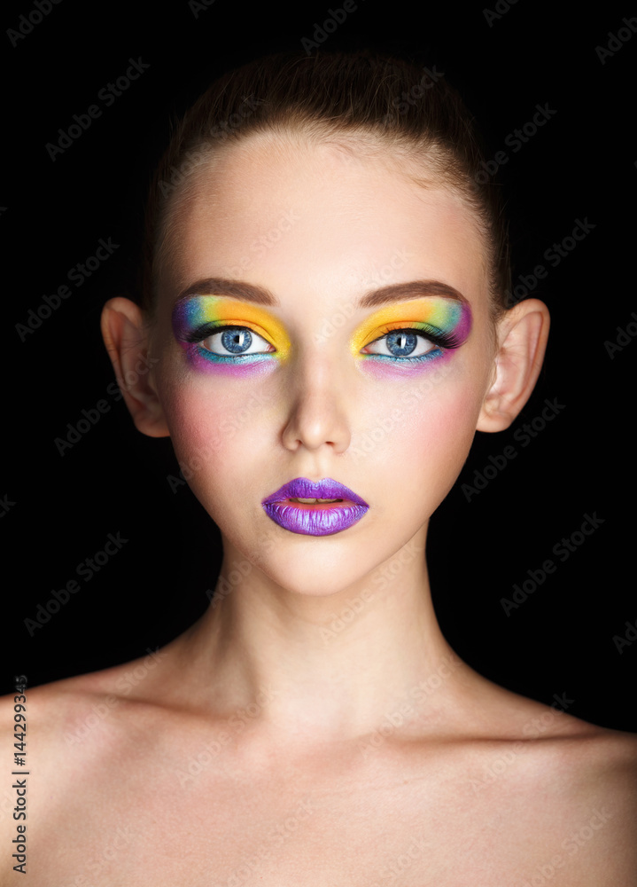 Fashion model girl portrait with colorful powder make up. Beauty woman with  bright color makeup. Close-up of Vogue style lady face, Abstract colourful  make-up, Art design. Black background. copy space Stock 写真