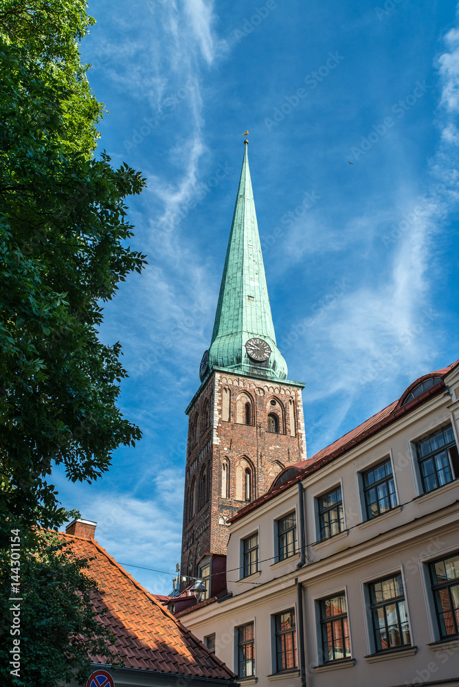 Church tower with clock. Riga, Latvia.